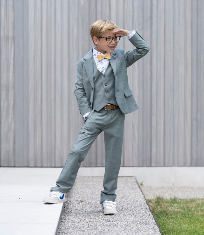 Grey-green three-piece costume with yellow bow tie