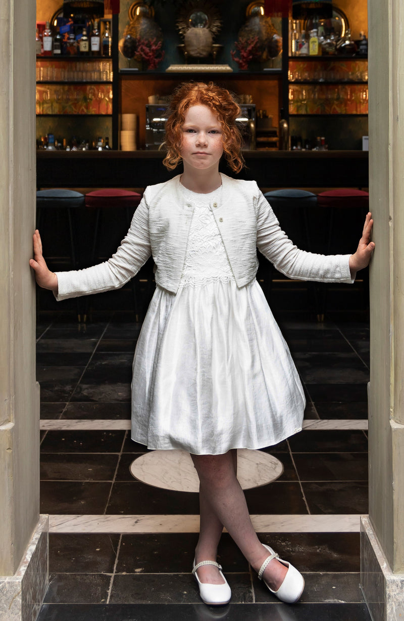 Festive pearly white dresses with accessories