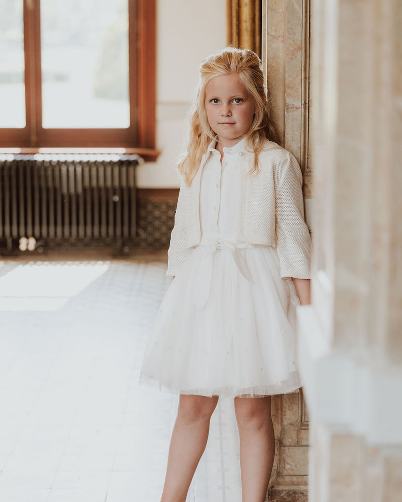 Witte jurk met cardigan