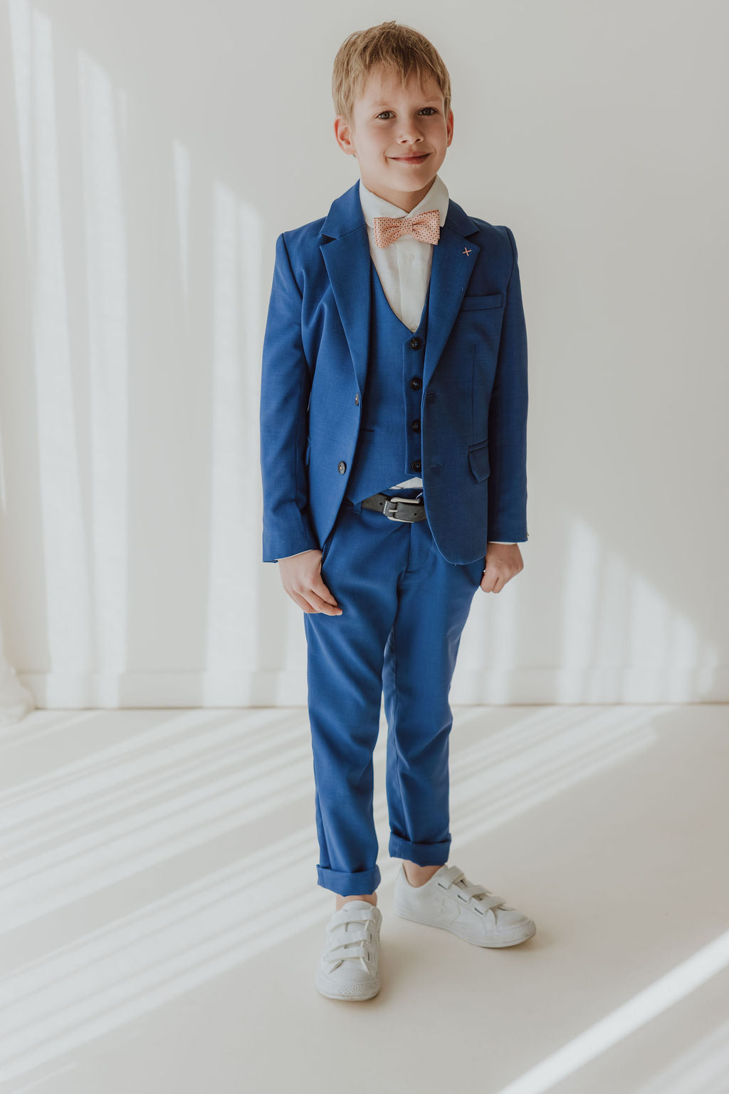 Three-piece blue suit with shoe print shirt