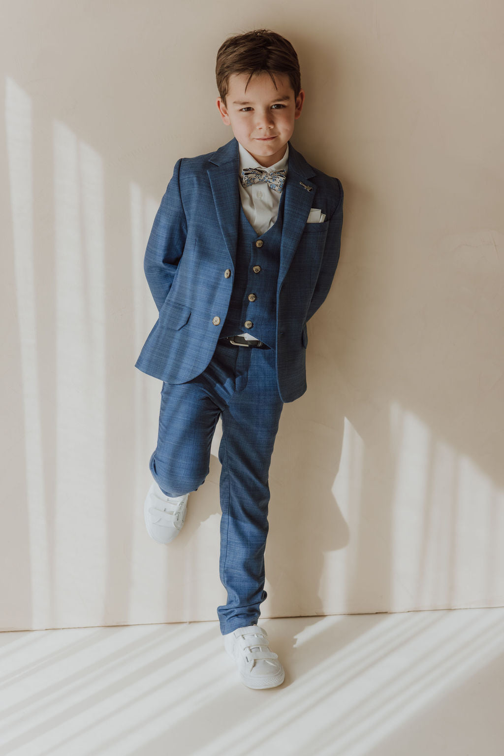 Driedelig blauw kostuum met gilet