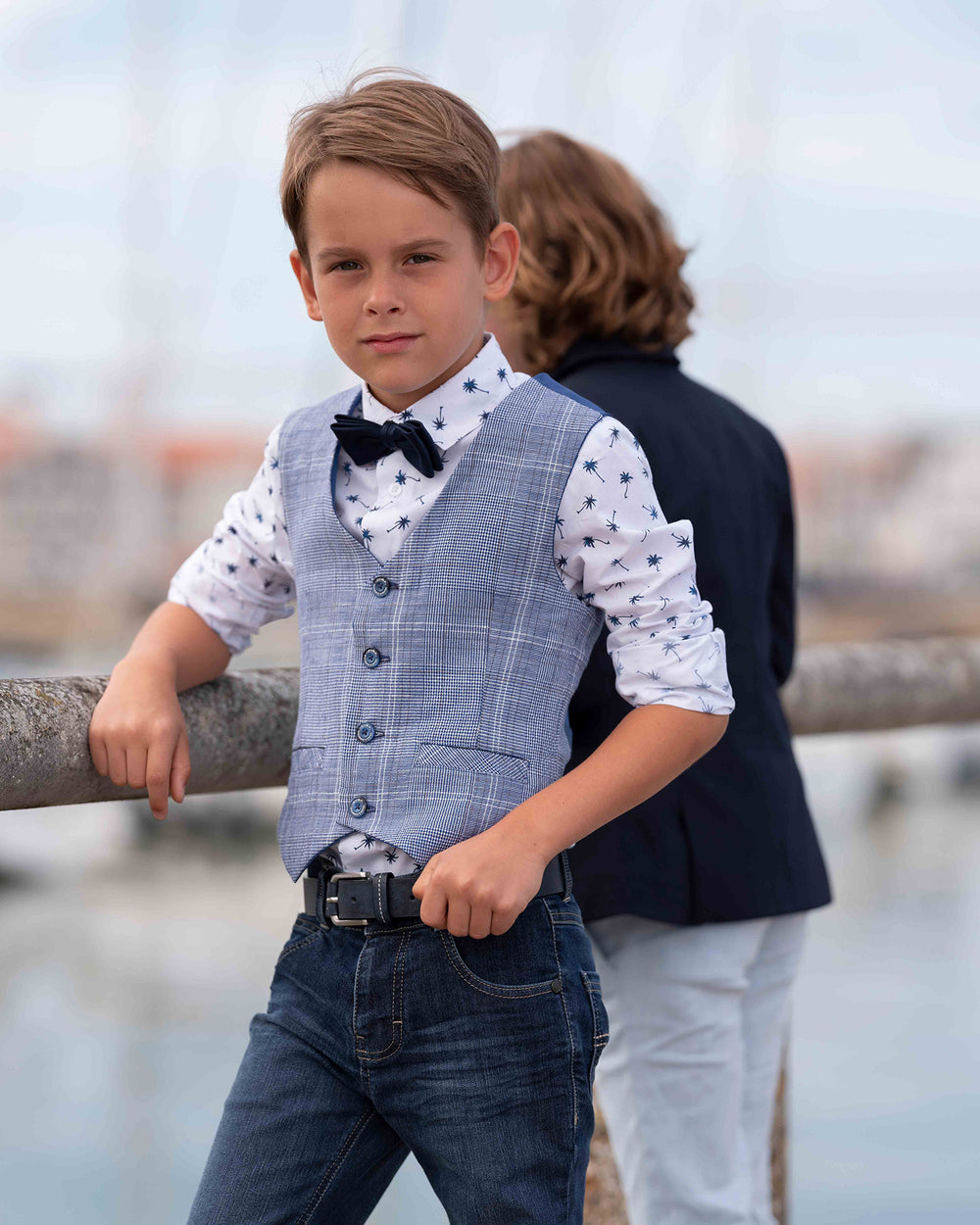 Classic jeans look with bow tie and white patterned shirt