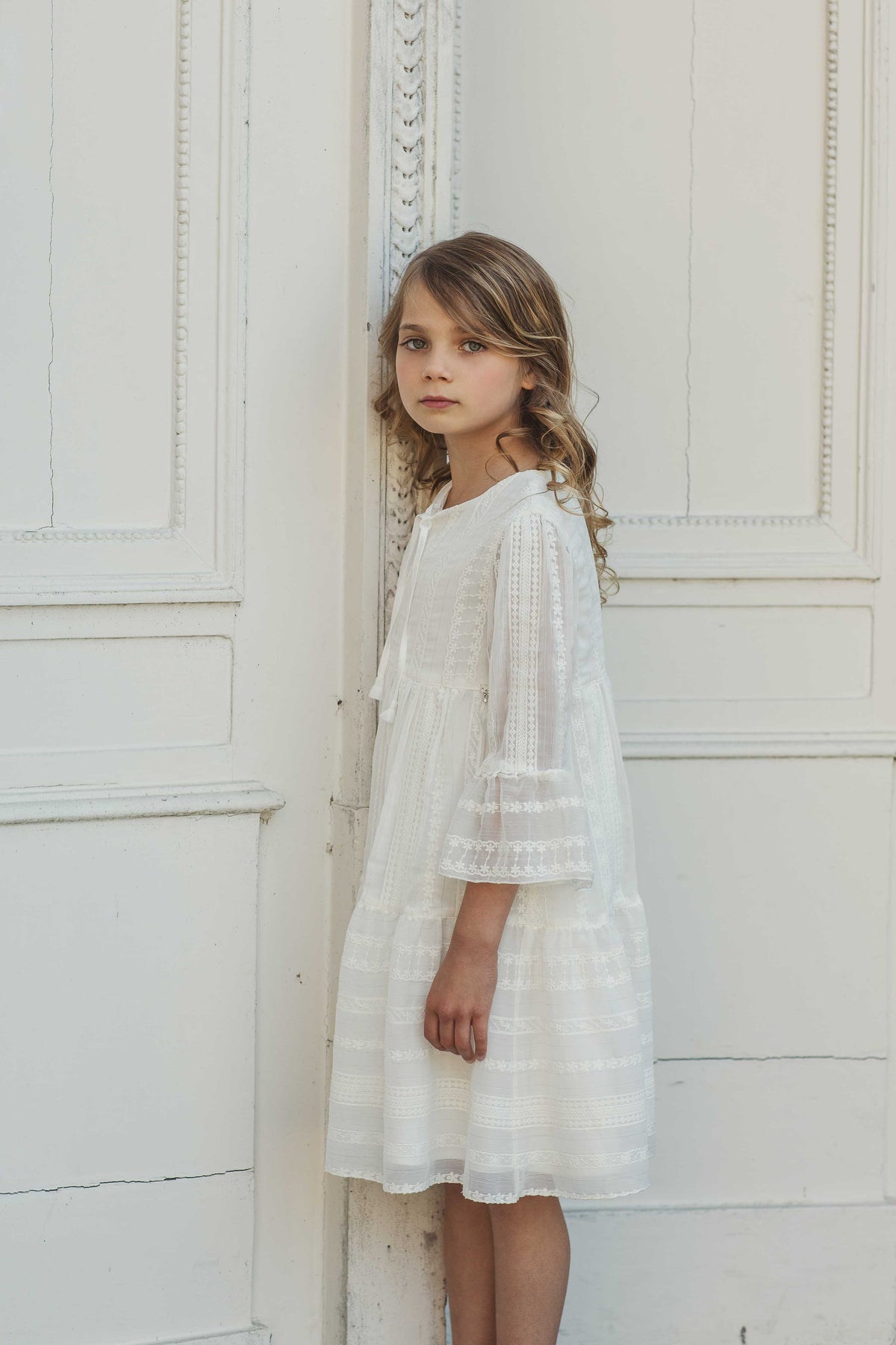 Pearl white boho style dress with three-quarter sleeves